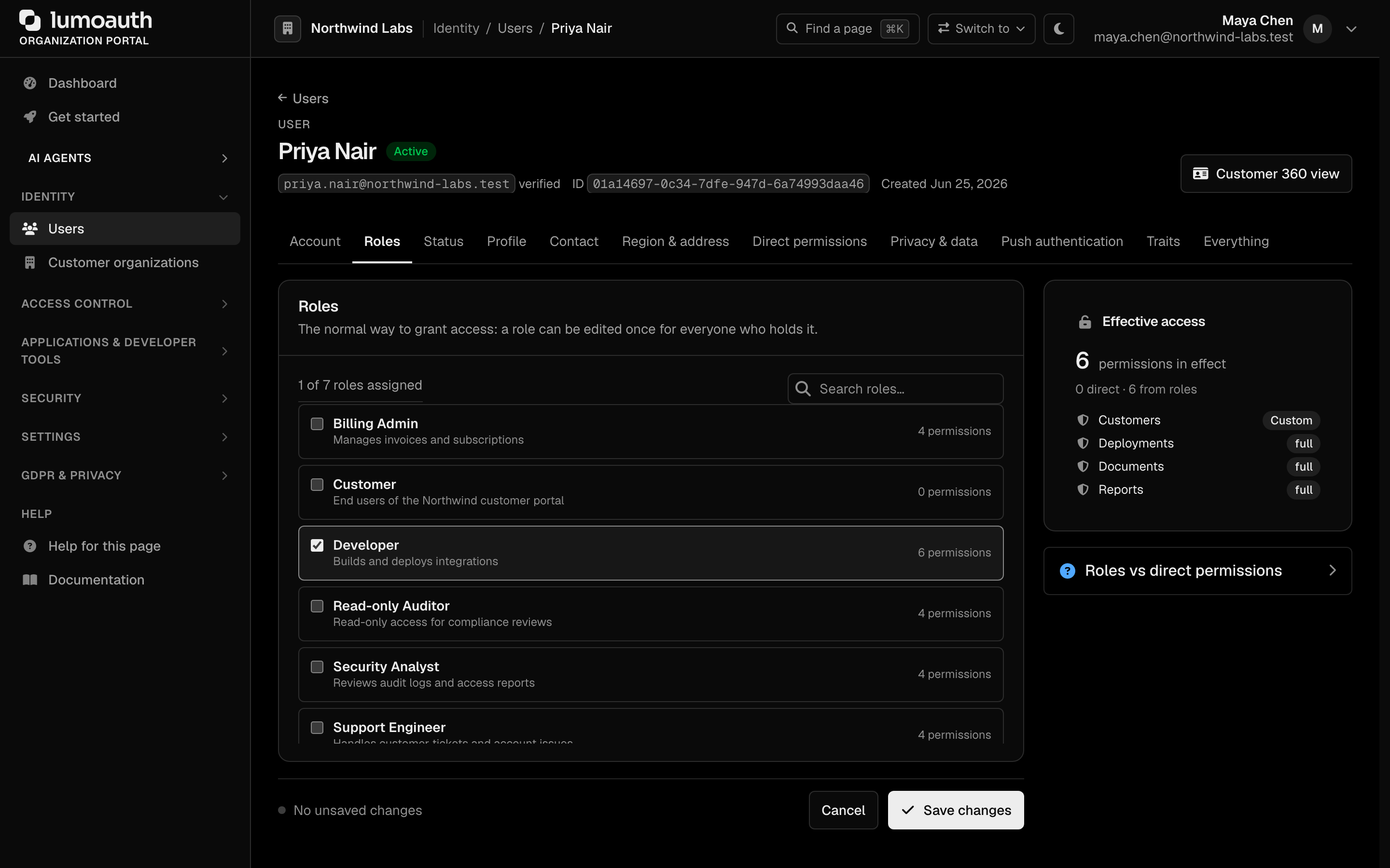 The Roles tab of a user, with a checkbox per role and the Effective access panel