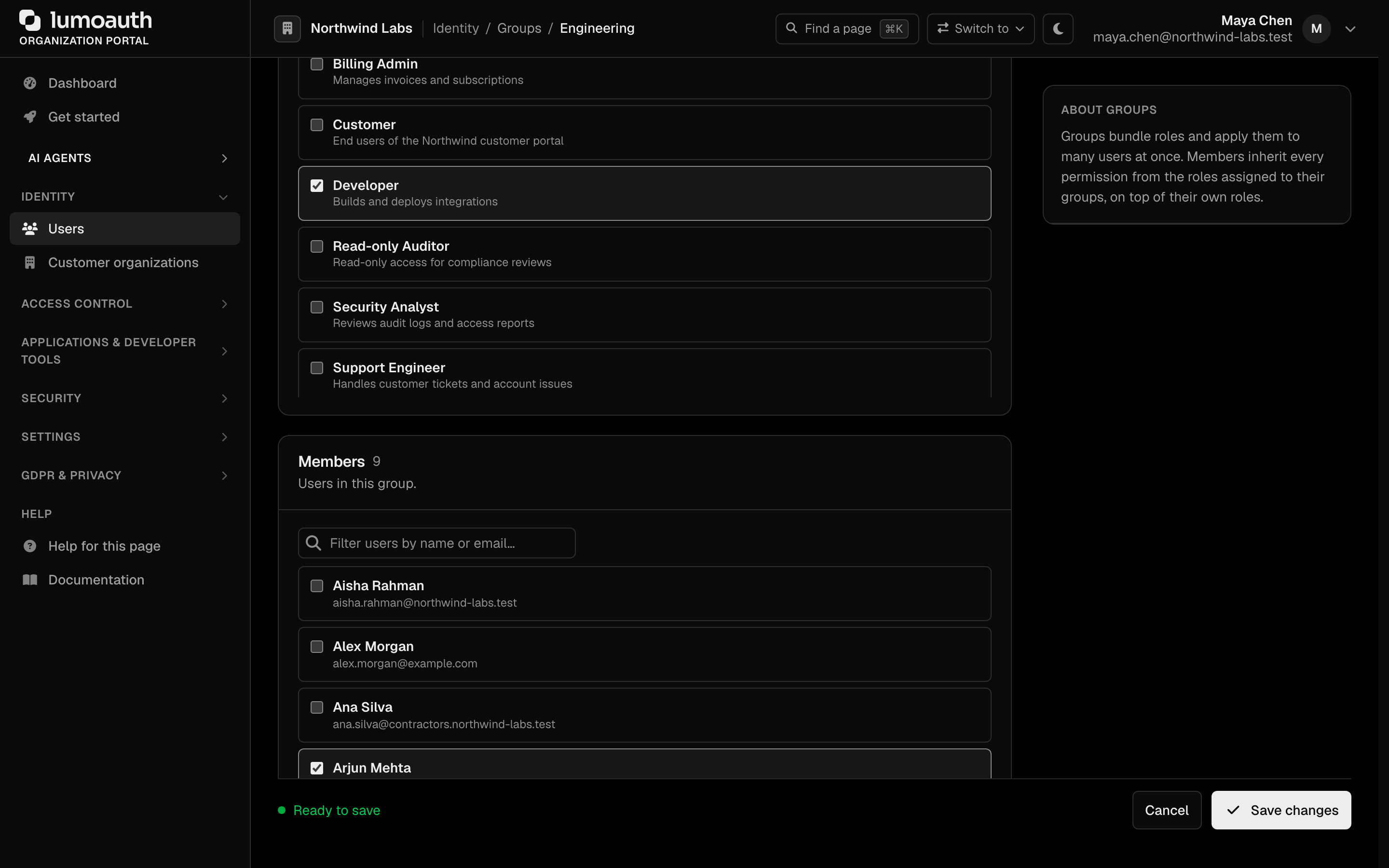 A group's Roles and Members sections, each a list of checkboxes